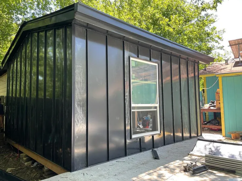 Black standing seam metal wall panels for Roof Inspection in Bel Air South