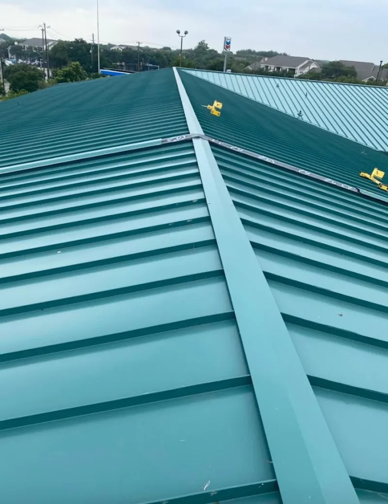 Green commercial metal roof ridge and valley for Metal Roof Repair in Bel Air South
